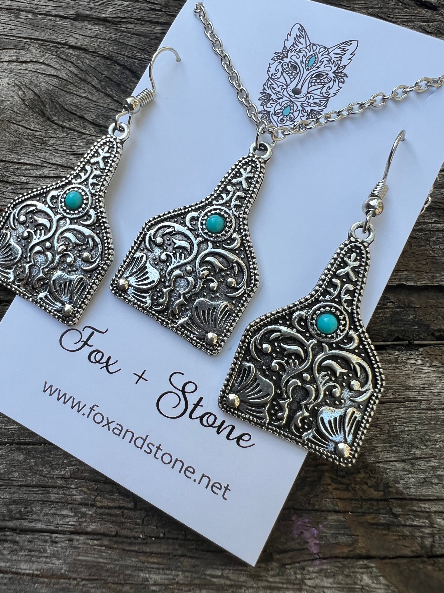 Beautiful Silver Swirl Pendant Earring Set